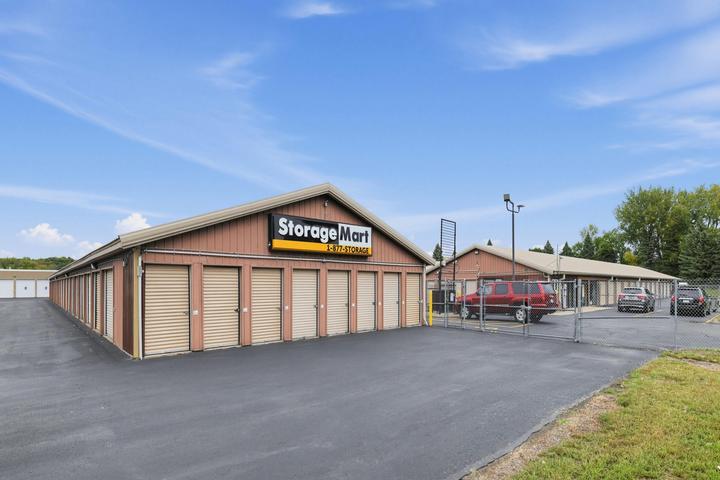 Units with signage and front gate at StorageMart in Chaska Minnesota