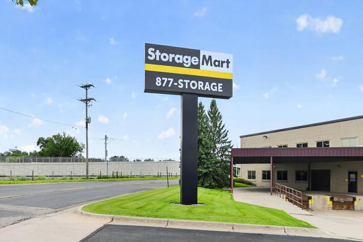 Facility exterior with signage at StorageMart in Hopkins Minnesota