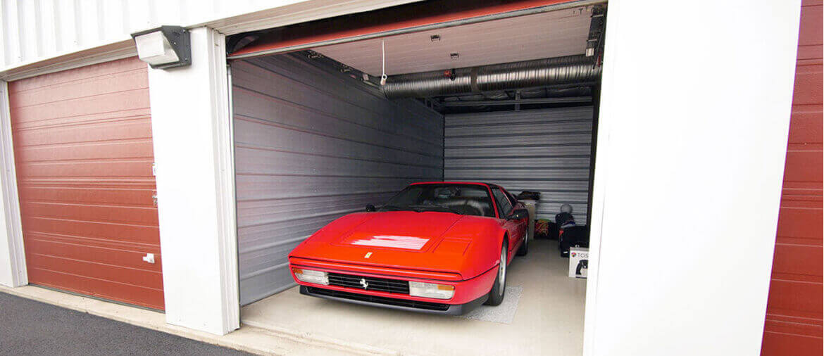 Red Car parked in a Self Storage Unit