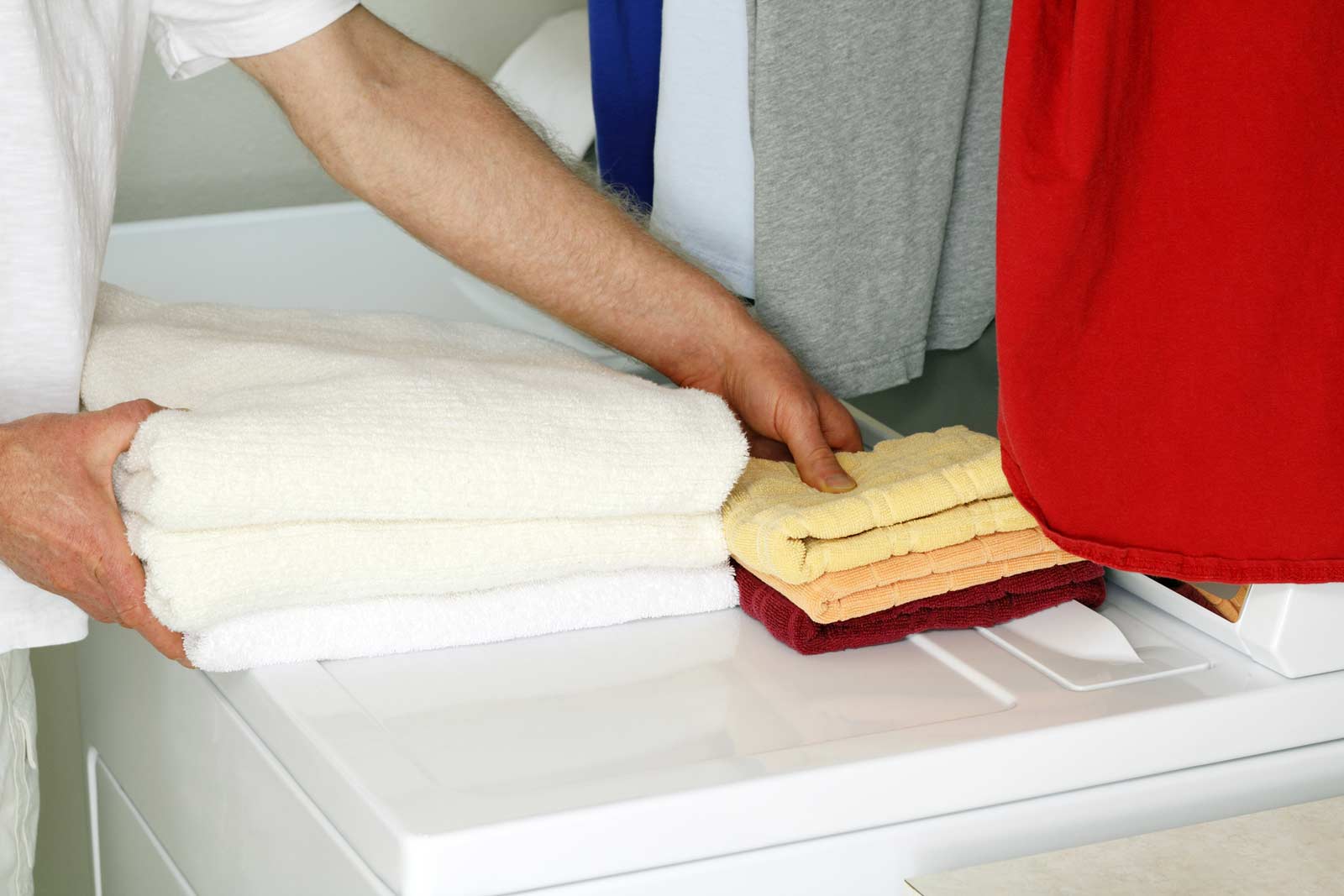 Man preparing a drying machine for a move to self storage